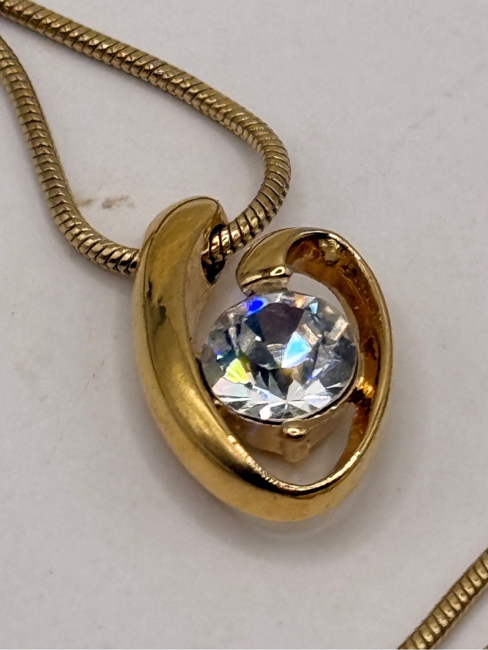 Gold Tone Vintage Swirl Pendant Necklace with Clear CZ
